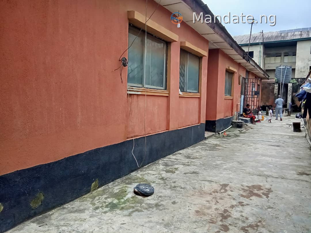 Building with two bedroom and self-contained rooms in Igando Phase 1 For Sale in in Igando Phase 1 Igando Alimosho Lagos photo 1